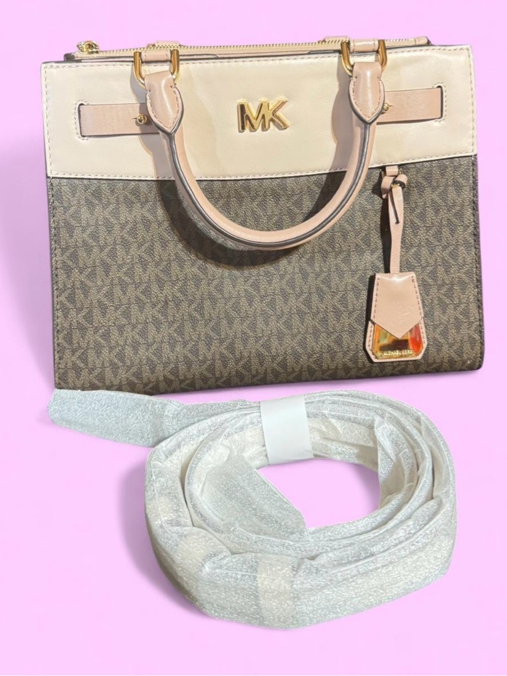 Michael Kors Reagan Medium Logo Satchel Bag in Brown and Soft Pink.